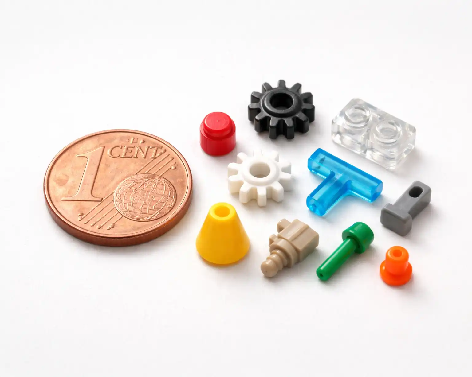 Small plastic components for microelectronics